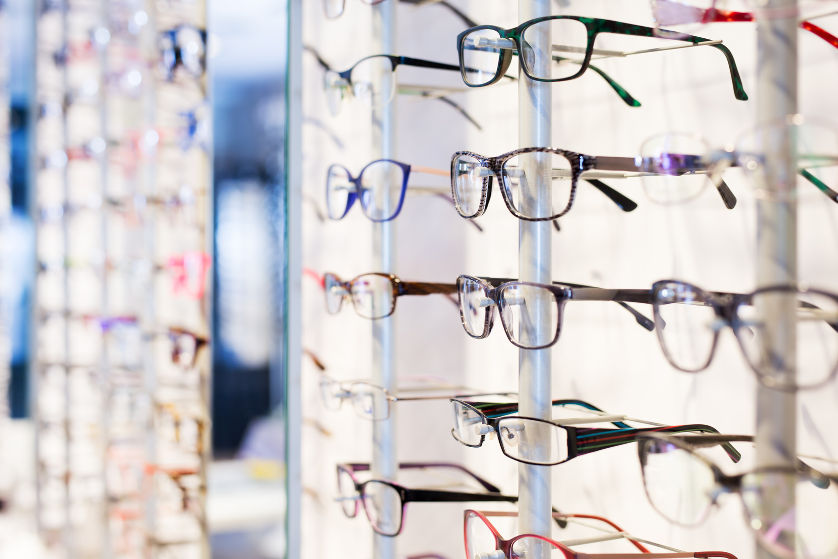 Glasses showcase in modern optic shop
